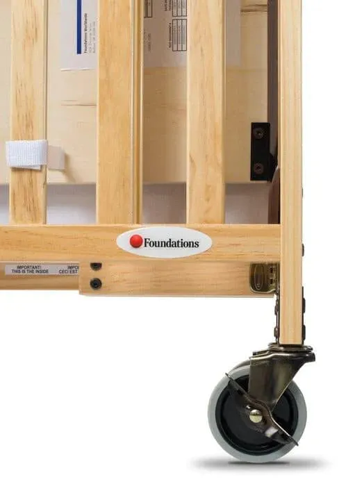 Foundations Compact HideAway™ EasyRoll™ Solid Wood Folding Crib - Slatted