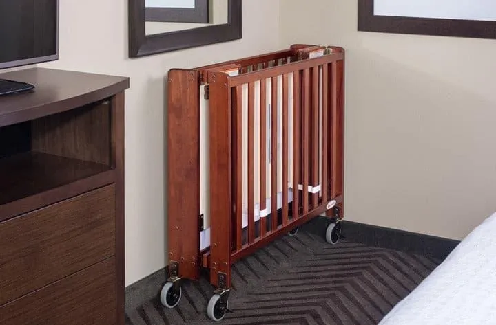 Foundations Compact HideAway™ EasyRoll™ Solid Wood Folding Crib - Slatted