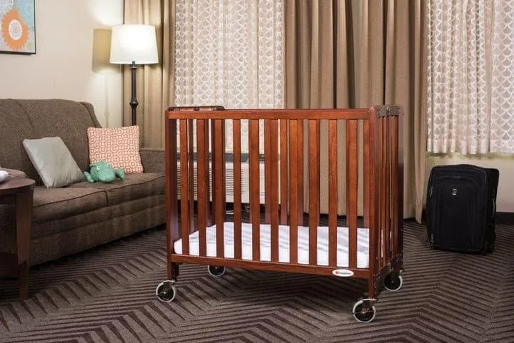 Foundations Compact HideAway™ EasyRoll™ Solid Wood Folding Crib - Slatted