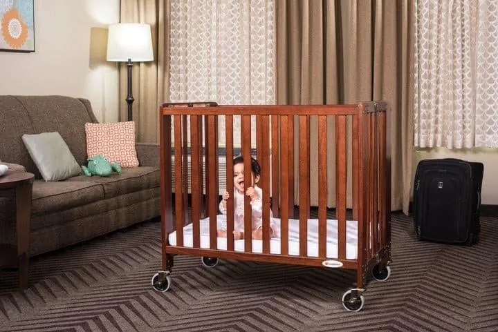 Foundations Compact HideAway™ EasyRoll™ Solid Wood Folding Crib - Slatted